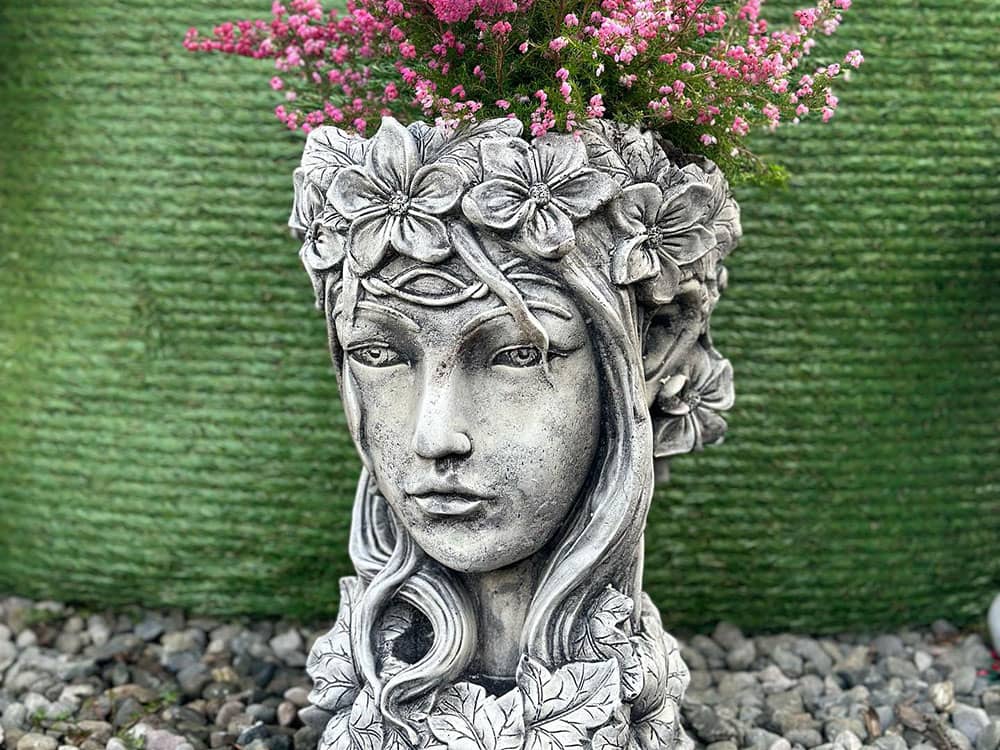 Female head stone ornament